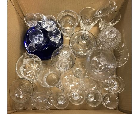 A collection of glassware to include ice cream plates, salad plates, Stuart crystal sherry glasses, custard cups, etc