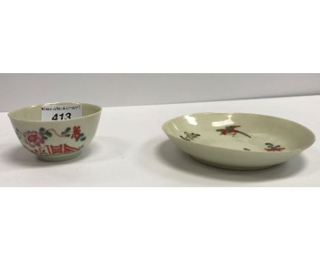 An 18th Century Bow chinoiserie design tea bowl and saucer, tea bowl 7.5 cm diameter, saucer 12.5 cm diameter CONDITION REPOR