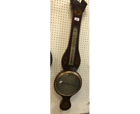 A 19th Century mahogany and marquetry inlaid barometer thermometer with alcohol thermometer, the silver dial inscribed "Lione