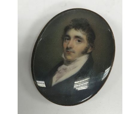 EARLY 19TH CENTURY ENGLISH SCHOOL "Gentleman in blue coat with black velvet collar and white stock", a miniature portrait stu