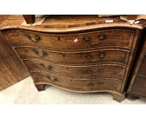 A George III mahogany serpentine-fronted chest, the cross-banded top satinwood strung and with moulded edge over a fitted com