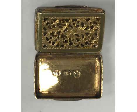 A George IV silver vinaigrette of rectangular form with engine-turned decoration, the top engraved with initials "EC", openin