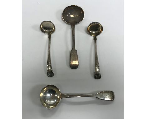 A pair of William IV Scottish silver "King's" pattern sauce ladles, bearing ownership initials "W" (by Andrew Wilkie, Edinbur