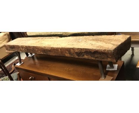 A rustic pig bench style stool on splayed supports, approx 169 cm wide x 28 cm deep x 33.5 cm high, together with a yew wood 