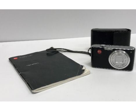 A Leica C-Lux I camera with leather case and instruction manual