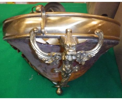 A French brass and glass ceiling light fitting in the early 20th Century taste