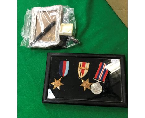 A World War II 1939-45 Star, Africa Star with Eighth Army bar and Defence medal, probably un-ascribed, together with a Waterm