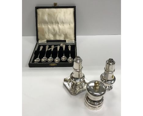 A modern silver pepper mill (by John Bull Limited of London 2000), together with a pair of modern salt and peppers of urn for