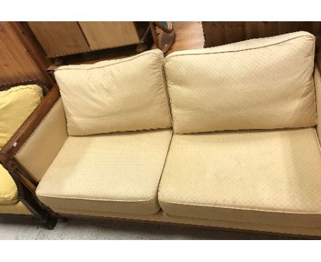 A Wesley Barrell Regency style three piece suite comprising three seat sofa, 177 cm wide, x 86 cm deep and two armchairs with