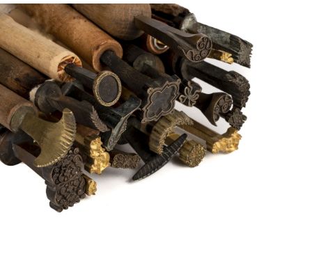 * Decorative finishing tools. 20 brass decorative finishing tools, comprising centre &amp; corner tools of traditional design