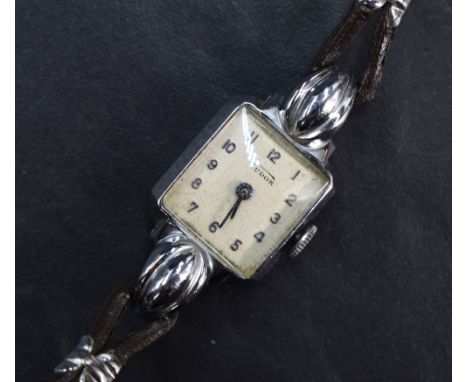 A lady's vintage Tudor wrist watch having Arabic numeral dial on a square face in a steel case on a leather cord strap