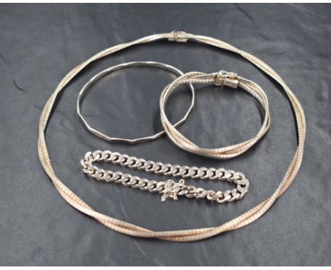 A silver collarette style double band articulated necklace with matching silver 3 band plaited bracelet, a silver curb chain 