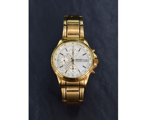 A Seiko chronograph wristwatch, the white dial with baton five minute markers, date aperture and three subsidiary dials, numb