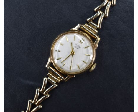 A lady's 1960's 9ct gold wrist watch by Tudor having Rolex case no:404322, baton numeral dial with sweeping second hand to ci