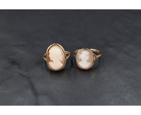 Two yellow metal shell cameo rings, both depicting maidens in profile mounted in bezel settings on shanks marked 9ct, ring si
