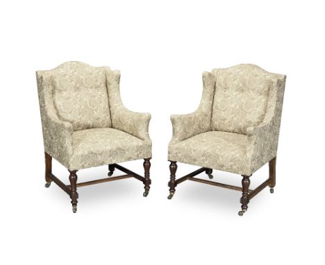 A matched pair of wingback 'box' armchairsThe mahogany chair late Victorian, the other example modern and made to matchEach o