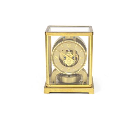 A late 20th century lacquered brass Atmos timepiececirca 1970's, the skeletonised dial signed Jaeger Le Coultre, Atmos, Swiss
