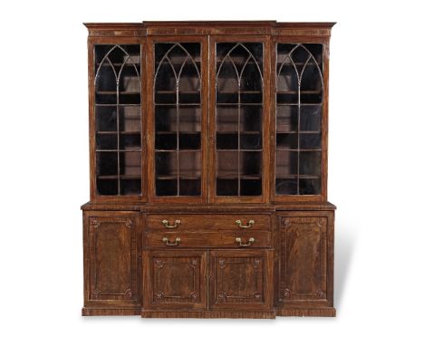 A George III mahogany breakfront secretaire bookcase1785-1800, probably by GillowsThe ogee moulded cornice above four segment