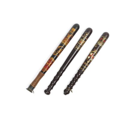 A group of late 19th/early 20th century polychrome and gilt decorated carved wood truncheonsincluding a Victorian truncheon, 