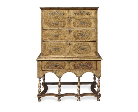 A Queen Anne or George I walnut, burr oak and featherbanded chest on stand1700-1725, the legs and stretchers of the stand are