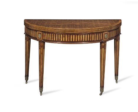 A George III harewood, purplewood, fruitwood inlaid and marquetry card table of large proportionsCirca 1775With ebonised and 