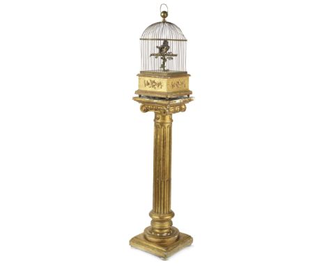 A late 20th century singing bird automaton together with an associated giltwood pedestalthe automaton in the Victorian stylet