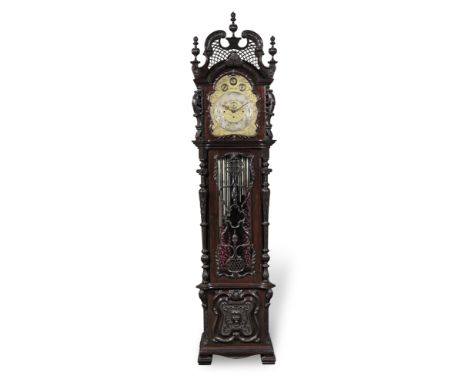 A very impressive late Victorian mahogany chiming longcase clockthe elaborate rectangular hood with high scrolling trellis pi