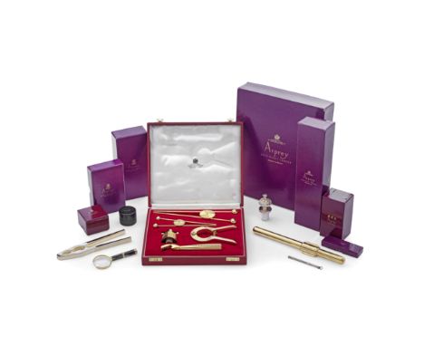 ASPREYS: a gilt plated cocktail / bar set together with other itemsunmarked but all retailed by Asprey's and in original Aspr