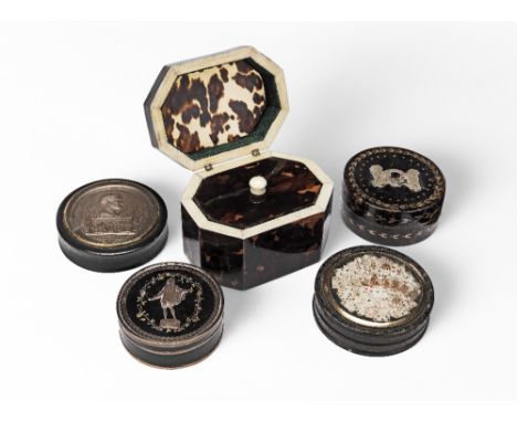A collection of five small 18th and 19th century boxescomprising a leather mounted snuff box, the cover painted with playing 