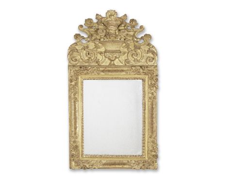 A Louis XIV giltwood and gilt gesso mirror1705-1720The late plate within a frame carved with flowers and foliage with scrolle