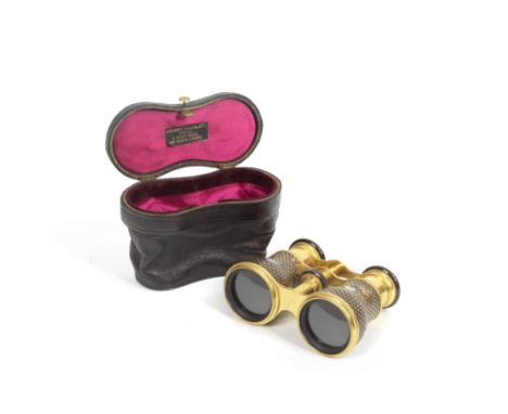 A good pair of late 19th century French gilt metal mounted gilt and brown lacquer decorated opera glasses in the Japonisme st