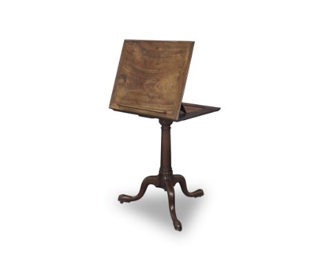 A George III mahogany tripod reading tableCirca 1765The hinged adjustable ratcheted top with a detachable reading rest and a 