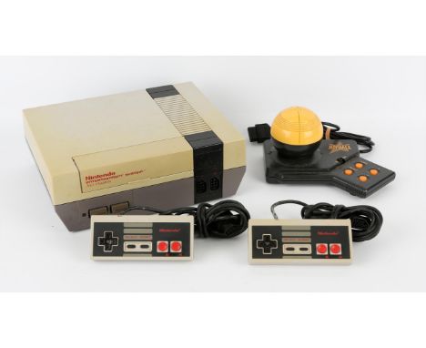 Nintendo Entertainment System (NES) with 2 controllers and power supply Also included in this lot are 2 peripherals for the S