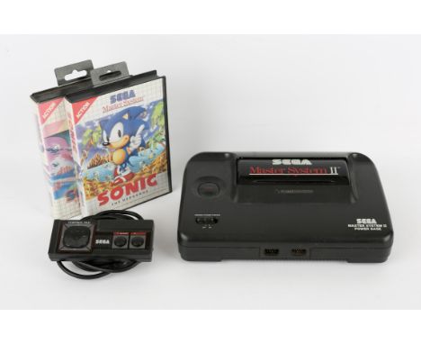 Sega Master System II Console with controller, power supply and 2 boxed games Games include: Sonic the Hedgehog and Sonic the