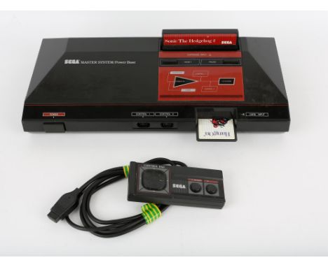 Sega Master System Console with instruction manual, controller, power supply and 2 games Games include Sonic the Hedgehog 2 a