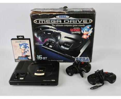 Sega Mega Drive Console, Sonic the Hedgehog Edition with Sonic the Hedgehog game Console is boxed, untested and comes with or