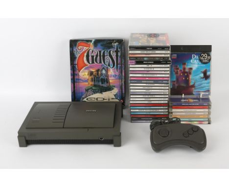 Philips Magnavox CD-I 450 System with original controller & cables, 24 Digital Video discs and 10 games Games include: The 7t