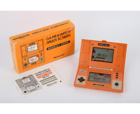 Nintendo Game & Watch Donkey Kong [DK-52] handheld console from 1982 (complete and boxed) Item is tested as working (22/04/24