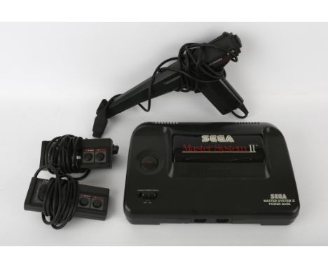 Sega Master System II console (loose) with power supply (x2), official controller (x2) and Sega Light Phaser gun accessory (x