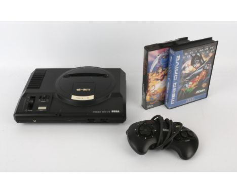 Sega Mega Drive Console with controller, power supply and 2 games Games include: Batman Forever (NTSC/Genesis) and Aladdin Ga