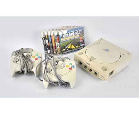 Sega Dreamcast console with 2 controllers, official power supply and 6 demo discs Games are complete, boxed and untested 