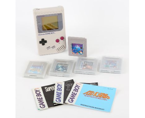 Nintendo Game Boy with 5 games (PAL) Games include: Kid Icarus: Of Myths and Monsters, Super Mario Land, Asteroids, Tetris an