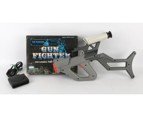 Sega Mega Drive light gun accessory bundle Includes: Boxed "The Punisher" light gun and Menacer light gun & sensor The boxed 