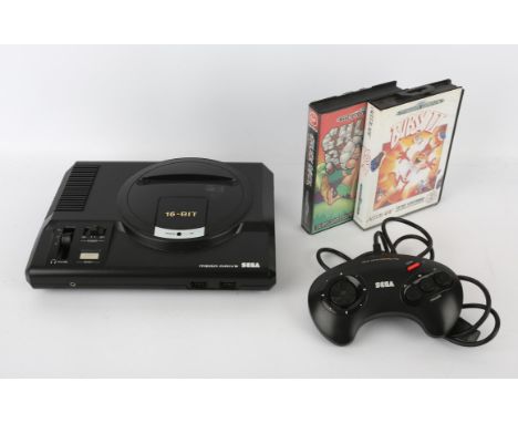 Sega Mega Drive Console with official controller, power supply and 2 boxed games Games include: Chuck Rock and Bubsy 2 All it