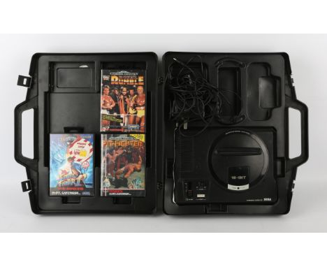Sega Mega Drive [console only] with AC adapter and three games Games include: Street Fighter II: Special Champion Edition, WW