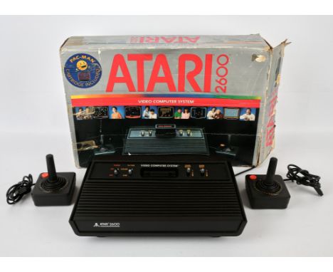Atari 2600 Darth Vader variant console, with power plug and 2 official Joysticks Console is boxed, untested and comes with no