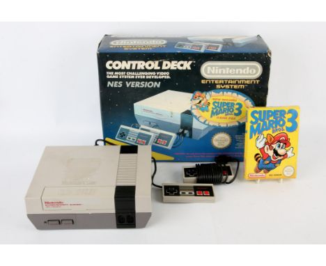 Nintendo NES Control Deck Console with Super Mario Bros. 3 game (w/two controllers) (PAL) Condition Report:  Items are comple