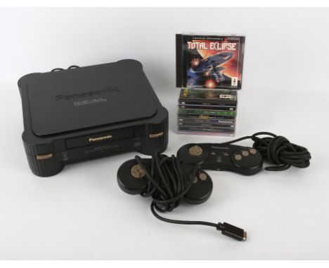 Panasonic 3DO FZ-1 R.E.A.L. console with US power supply, 2 controllers and 9 boxed games Games include: Powers Kingdom (fact