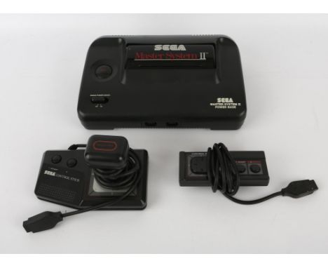 Sega Master System II console (loose) with power supply (x2), official controller and Sega Control Stick accessory (x1) All i