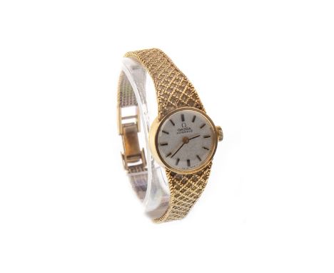 LADY'S OMEGA AUTOMATIC NINE CARAT GOLD WRIST WATCH, signed Omega 661 movement numbered 34162558, the round dial with applied 